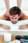 Masseur Doing Massage On Man Body In The Spa Salon Stock Photo