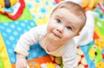 Infant Boy On Playmat Stock Photo