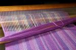 Detail Of Fabric In Comb Loom With Ultraviolet And Lilac Colors Stock Photo