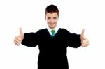 School Boy Showing Thumb Up Stock Photo