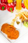 Classic Milanese Veal Cutlets And Vegetables Stock Photo