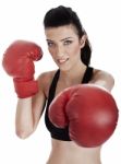 Woman Boxer Giving A Punch Stock Photo