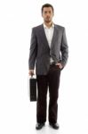 Handsome Businessman Standing With His Office Bag Stock Photo