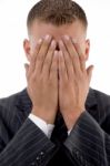 Shy Businessman Hiding His Face Stock Photo