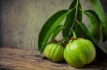 Still Life With Fresh Garcinia Cambogia On Wooden Background (th Stock Photo