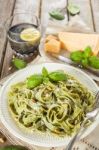 Homemade Spinach Pasta With Pesto And Parmesan Cheese Stock Photo