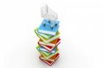 Stack Of Colourful  Books And Trolley Stock Photo