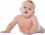 Cute Baby Boy Lying On His Tummy Stock Photo