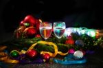 Two Glasses Of Champagne With A Christmas Decor In The Background Stock Photo