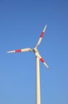 White Windmill With Red Bar Stock Photo