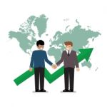 Business Handshake On The Background Of World Map Stock Photo