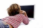 Back Pose Of Little Child Watching Tv Stock Photo