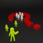 Green Person And Group Person In Red Question Mark Stock Photo