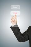 Businessman Pressing Fair Button Stock Photo