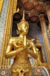 Golden Statue Of Kinara Sawasdee At Wat Phra Kaew In Grand Place Complex In Bangkok, Thailand Stock Photo