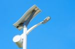 Solar Energy Light Pole Road With Blue Sky Background Stock Photo