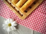 Homemade Deep Frying Spring Rolls With White Daisy Stock Photo