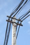 Electric Cable On Pole In Blue Sky Stock Photo