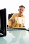 Man Pointing On Computer Screen Stock Photo