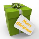 Merry Christmas Gift Means Xmas And Seasons Greetings Stock Photo