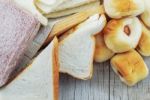 Breads On Wooden Stock Photo