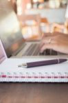 Opened Laptop On Wooden Work Table Stock Photo