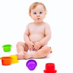 Cute Infant Boy With Toys Stock Photo