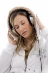 Young Woman Enjoying Music With Headphones Stock Photo