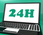 24h On Laptop Shows All Day Service On Web Stock Photo