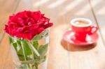 Beautiful Table Decorated With Coffee And Red Rose Stock Photo