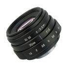 A Small 35 Mm Lens On White Background Stock Photo