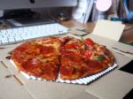 Pizza On Working Table Stock Photo