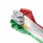 Flag Of Tajikistan On Hand Stock Photo