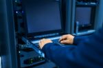 Man Fix Server Network In Data Center Room Stock Photo