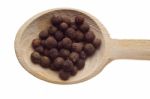 Pepper Seeds On Wooden Spoon Stock Photo