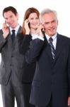 Business People With Phone Stock Photo