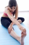 Beautiful Healthy Young Woman Doing Exercise At Home Stock Photo