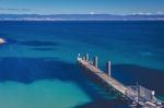 Freycinet Pier By Coles Bay In Tasmania Stock Photo