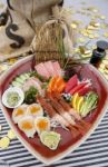 Mixed Sashimi On Red Ceramic Plate Stock Photo