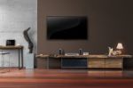 Led Tv On Concrete Wall With Wooden Furniture In Living Room Stock Photo