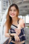 Portrait Of Thai Chinese Adult Beautiful Girl Denim Blue Bag Credit Card Stock Photo