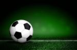 Soccer Ball On Grass Background Stock Photo