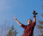 Happy Woman Showing Victory-sign Stock Photo