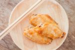 Grilled Chicken Wings On Wooden Plate Stock Photo