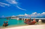 Fishing Boat And Wood Waterfront Pavilion Stock Photo