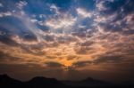 Sunrise Rays On Morning Blue Orange Sky Cloud With Mountain Stock Photo