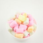 Marshmallow In Bowl On White Background Stock Photo