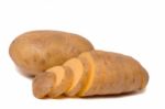 Sliced Potato And Whole Isolated On A White Background Stock Photo