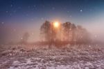 Magic Winter Christmas Night. Snowfall Scene On A River Stock Photo