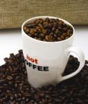 Mug Of Coffee Beans Stock Photo